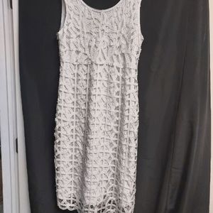 White Lace Dress by Kroshetta by Papillon: Size M. Lined in a White Polyester .